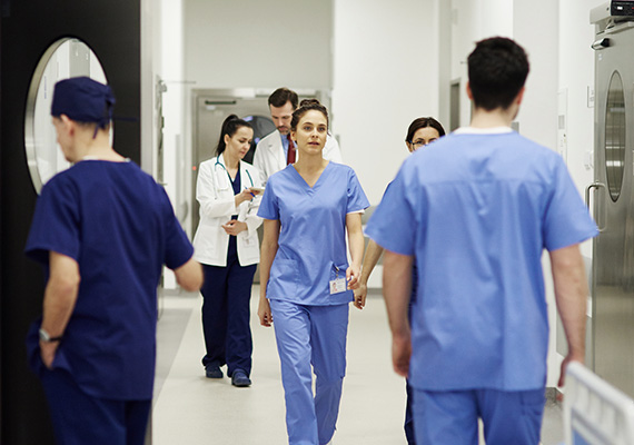 Nurses walking in the hallway of a hospital